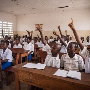 Students in class at their primary school in Kumala community in Koinadugu District, Sierra Leone.

At the school, volunteer parents prepare and serve warm, nutritious meals for students each day, thanks to Catholic Relief Services' "All Pikin For Learn" project, which translates as, "Every Child Should Be Educated."

The project is part of the McGovern-Dole International Food for Education and Child Nutrition initiative sponsored and funded by the U.S. Department of Agriculture (USDA).

The school feeding and nutrition program uses school lunches as an incentive to increase school enrollment and keep students in school.

The project benefits over 32,000 primary school-aged children attending 192 schools. It also provides training for 450 teachers, and strengthens the capacity of local school management committees.